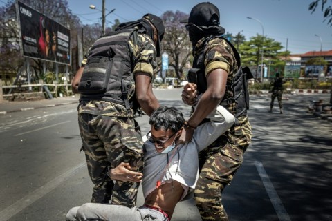 Protesters march in Madagascar capital despite president's promise to resign