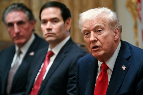 US President Donald Trump speaks alongside Secretary of the Interior Doug Burgum (L) and Secretary of State Marco Rubio (R) during a cabinet meeting in the Cabinet Room of the White House in Washington, DC, on October 9, 2025. Trump said Thursday he would try to go to Egypt for the signing of a Gaza ceasefire and hostage release deal between Israel and Hamas.