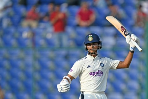 India's Yashasvi Jaiswal celebrates after scoring 150 runs