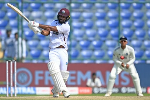 West Indies' John Campbell plays a shot
