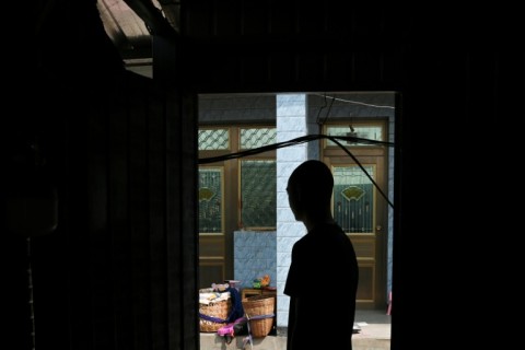 Freed: Sun, 25, whose identity AFP are protecting, back in his village in Yunnan, China