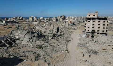 An Israeli soldier comforts a woman during a memorial service Thursday for those killed in the October 7, 2023 attacks
