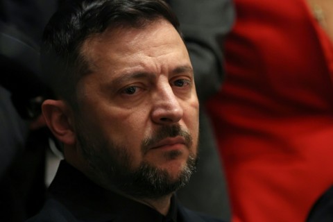 Ukrainian President Volodymyr Zelensky meets with unseen US President Donald Trump at the White House