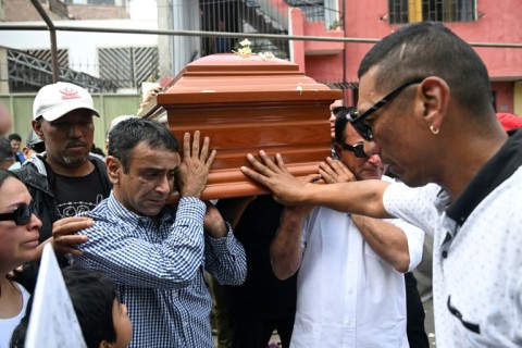 Relatives and friends carry the coffin of Eduardo Ruiz, a demonstrator killed on October 15 during a protest against Peru's interim President Jose Jeri
