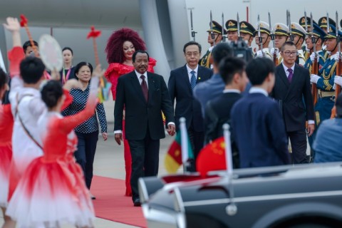 Biya's (C) last official trip was to China in September 2024