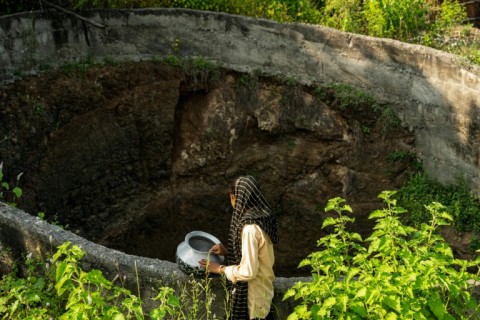 As men moved to cities in search of work, girls are left to take on the responsibility of collecting water