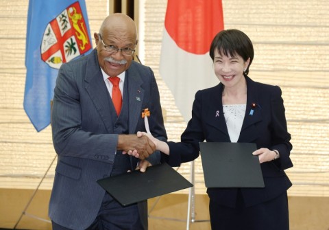 Sleep is for slackers: Japan's Prime Minister Sanae Takaichi (right)