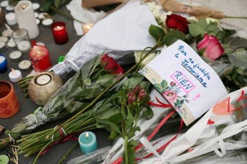 'Nothing justifies terrorism': people placed flowers in a central Paris square
