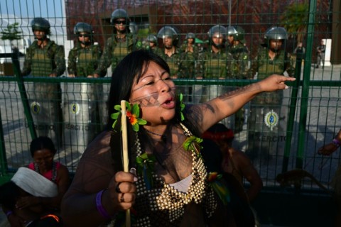 Alessandra Koran, a member of the Munduruku Ipereg Ayu movement, spoke as Indigenous people held a protest blocking the main entrance to the UN COP30 climate summit in Belem, Brazil