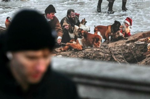 A woebegone Father Christmas featured in the AI mural, complete with a half orange beard