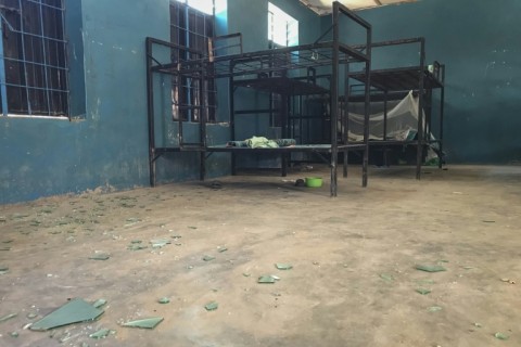 Empty bunk beds, shattered glass and scattered belongings are all that remain in this student dormitory at the school
