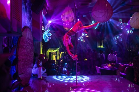 Dancers perform on stage at the Zaza, in the ritzy Lagos neighbourhood of Victoria Island