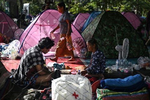 Displaced residents rest at an evacuation center in the Thai border province of Surin during clashes along the Thai-Cambodia border