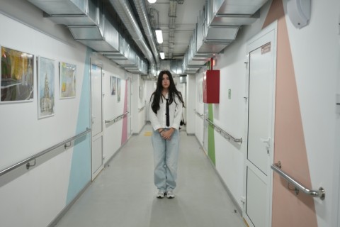 Yevenhelina Tuturiko, 14, in the corridor of her underground school in Kharkiv