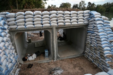 Displaced residents rest in a bunker in Thailand's Surin province