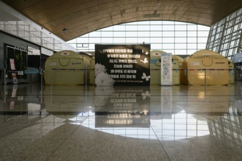 A banner put up by families of victims of the Jeju Air Flight 2216 plane crash at Muan International Airport