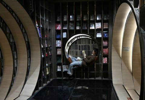 Some bookstore shoppers complain the constant photographs taken by visitors interferes with their ability to read