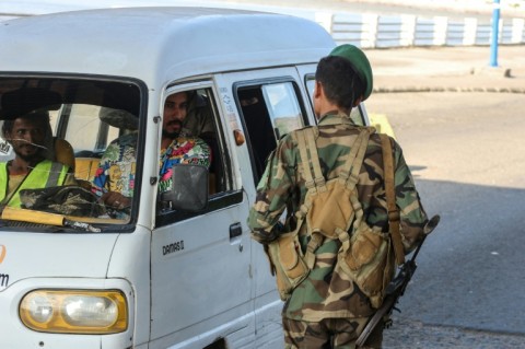 A member of the security forces mans a checkpoint in Aden, where Yemen's internationally recognised government is based