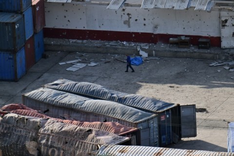 Burned containers are seen at the Port of La Guaira, Venezuela after US forces launched a "large scale strike"