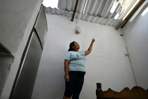 Linda Unamuno burst into sobs as she described US airstrikes on the port city of La Guaira north of Caracas