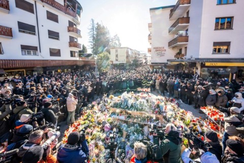 More than a thousand gathered to pay their respects to the dead and injured