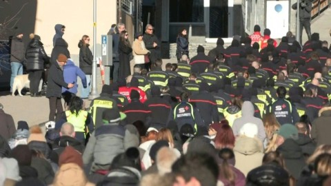 Emergency crews and Crans-Montana residents take part in silent march for fire victims