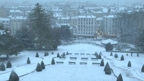 Paris rooftops turn white as fresh snowfall sweeps across northern and western France