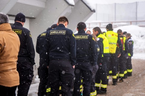 Emergency responders arriving ahead of a minute of silence