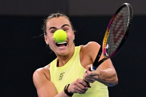 Aryna Sabalenka hits a return to Marta Kostyuk in the Brisbane International final