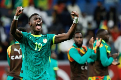 Senegal's Moussa Niakhate celebrates after the 2022 champions beat Egypt in the semi-finals