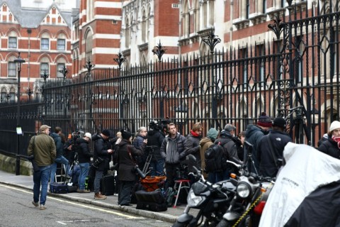 The media waits outside the High Court in London on the first day of Harry's case against a top UK newspaper publisher