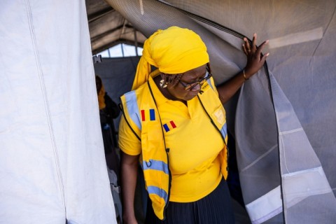 Kindi Hassan, a mental health and psychosocial support manager for the NGO International Rescue Committee, helps refugees at Goudrane camp