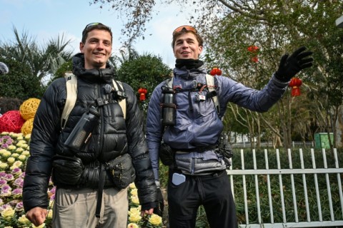 After 518 days on the road, French duo Loic Voisot (R) and Benjamin Humblot are finally in Shanghai