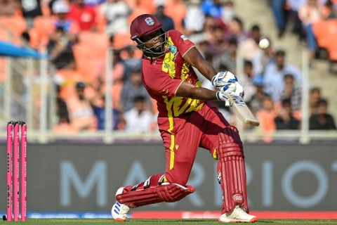 West Indies' Romario Shepherd hits a six against South Africa