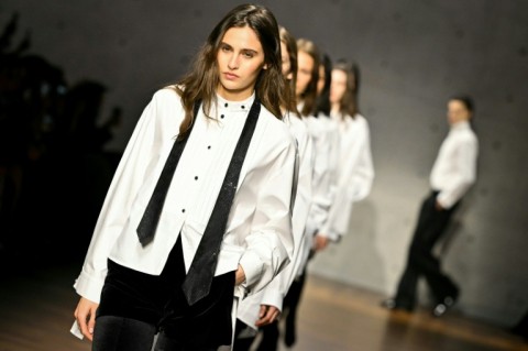 Skinny black pants, furry coats and lots of lace were seen on Milan catwalks during Fashion Week.