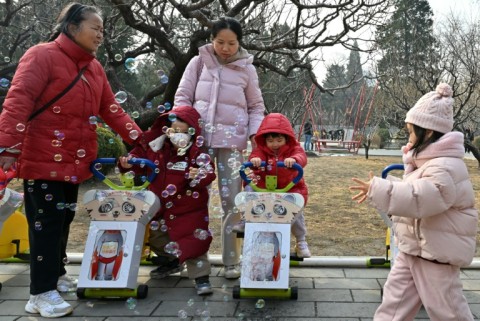Chinese lawmakers this week proposed measures such as extra cash for families with three children and lowering the legal marriage age from 22 for men and 20 for women to encourage earlier childbearing