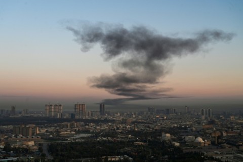 AFP photographer captures smoke rising near Erbil International Airport after an explosion on March 1