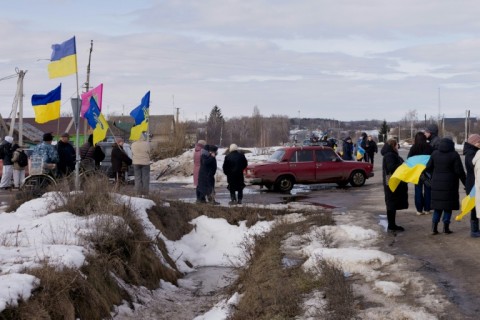 Ambulance sirens and bus horns wailed as they ferried emaciated Ukrainian prisoners  -- with shaved heads and wounds -- back home