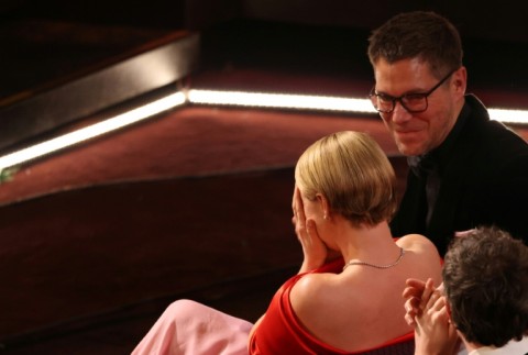 Jessie Buckley, sitting next to her husband Freddie Sorensen, was overwhelmed with emotion when the award was announced