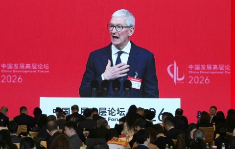 Apple CEO Tim Cook makes regular visits to China