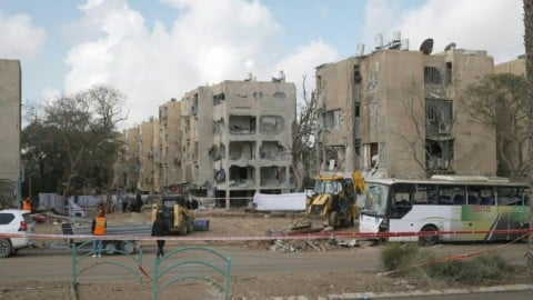Damaged residential buildings after Iranian strikes on Israel's Arad