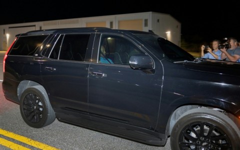 Tiger Woods is driven from the Martin County (Florida) Jail after being arrested for driving under the influence after a car crash near his home