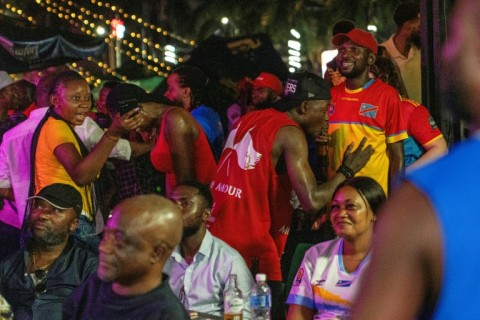 Congolese supporters in Kinshasa watch a broadcast of the match