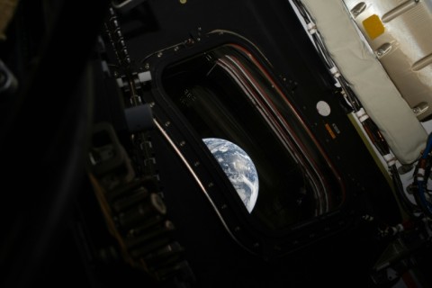 A view of Earth taken by Artemis 2 commander Reid Wiseman from one of the Orion spacecraft's four main windows