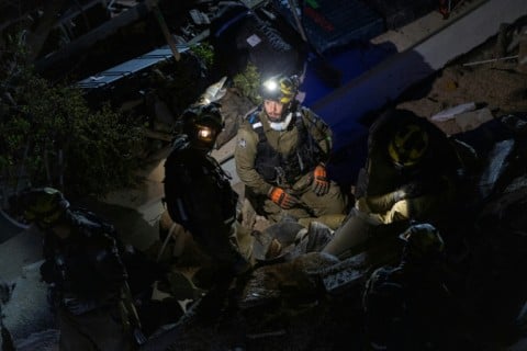 The Israeli military and medics said a missile fired from Iran hit a residential building in the northern city of Haifa