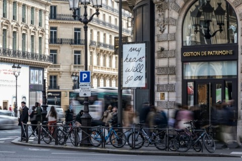 Paris is covered in billboards and posters for Dion's tour