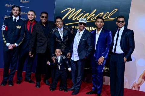 Family members including (L-R) son of Michael Jackson Bigi Jackson, son of Michael Jackson Prince Jackson, US singer Jackie Jackson, US singer Jermaine Jackson, US singer Marlon Jackson pose for photogaphers at the premiere