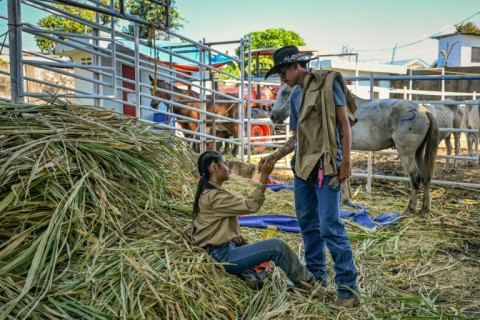 Keziah Ramonal takes a rest after competing in the carambola event