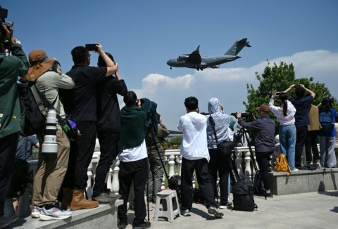 A US Air Force C-17 lands at Beijing Capital Airport in Beijing on May 11, 2026, ahead of a visit by President Donald Trump