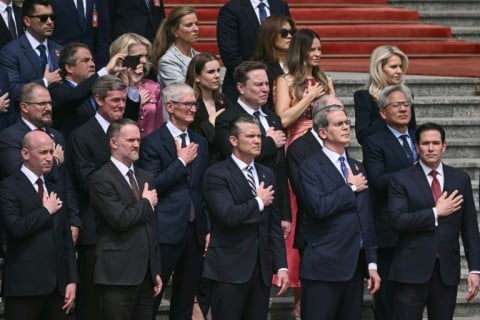 US Secretary of Defense Pete Hegseth (bottom C), US Treasury Secretary Scott Bessent (bottom centre R), Secretary of State Marco Rubio (bottom R),and business people attend a welcome ceremony for US President Donald Trump in Beijing